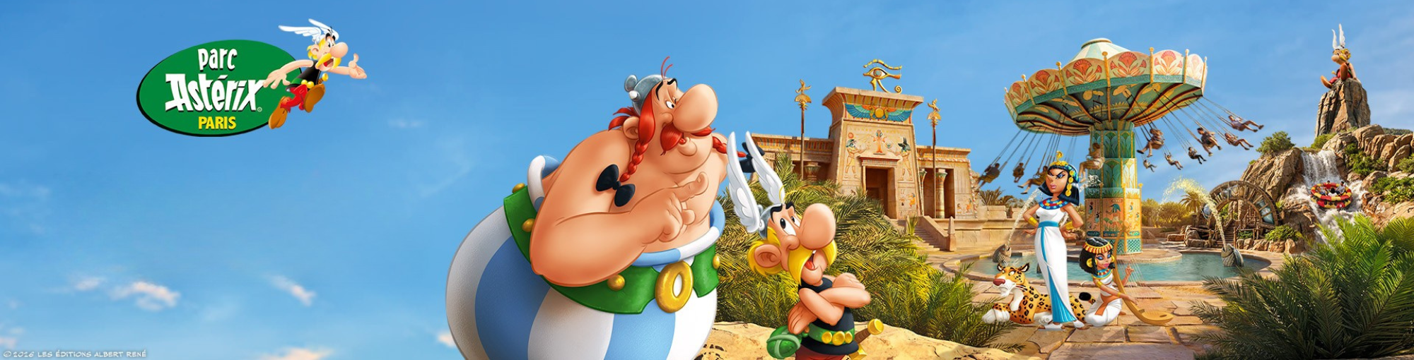 A colorful Parc Astérix banner shows Asterix and Obelix in front of an Egyptian-themed setting with temples, palm trees, and rides, promoting a journey to Egypt.